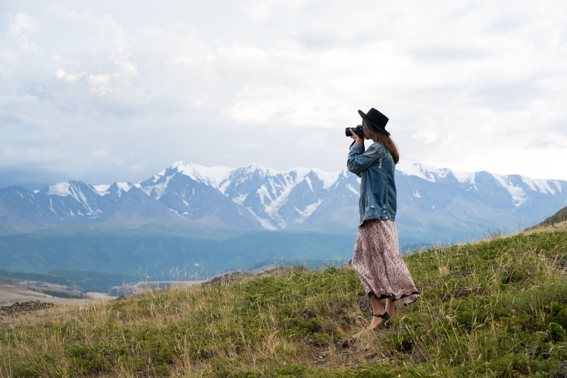 Travel author looking out over misty mountains